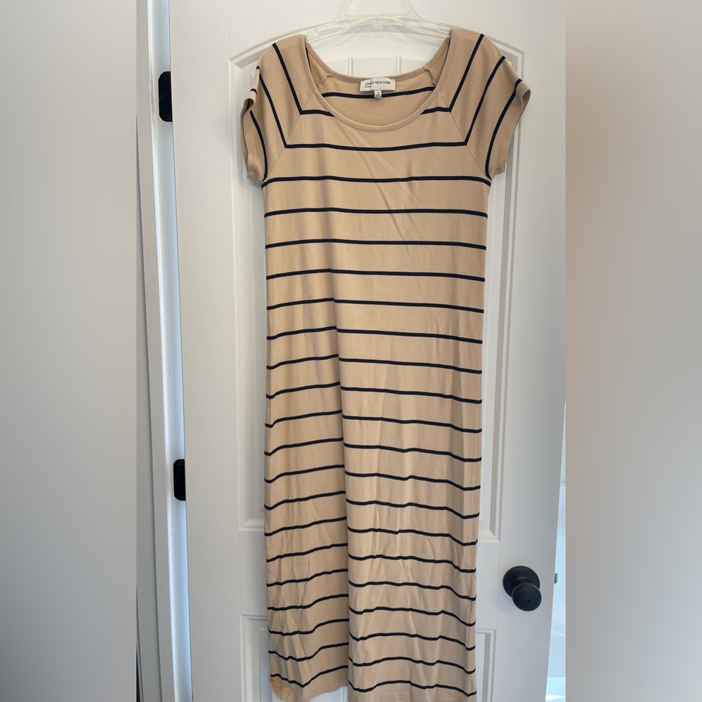 Casual dress that falls to the ankles. Worn once. Tan with black stripes